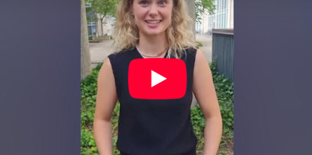 Billede fra video på Youtube af ung kvinde, der smiler.